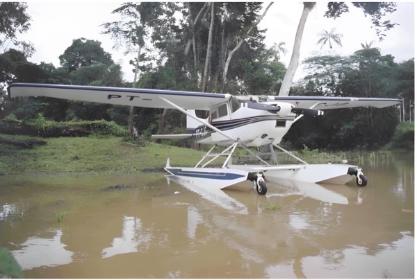 The float plane in the yard. (Chapter 9)